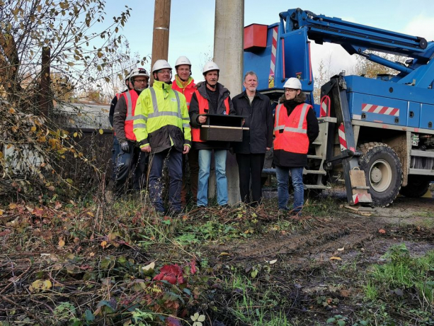 Equipe en charge de l'installation du nichoir